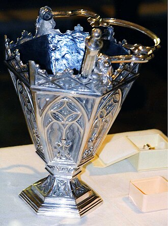 Aspergillum in a silver aspersorium